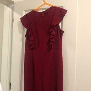 Burgundy jumpsuit never worn before, but has no tag on.